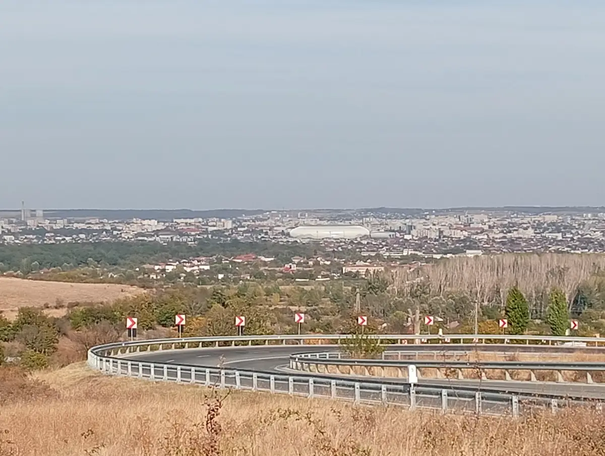Zoomed in: the white oval of the stadium in the middle of the city