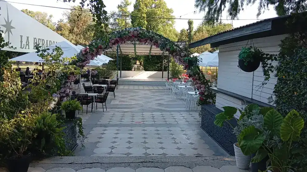 A lakeside terrace, laid up for the evening
