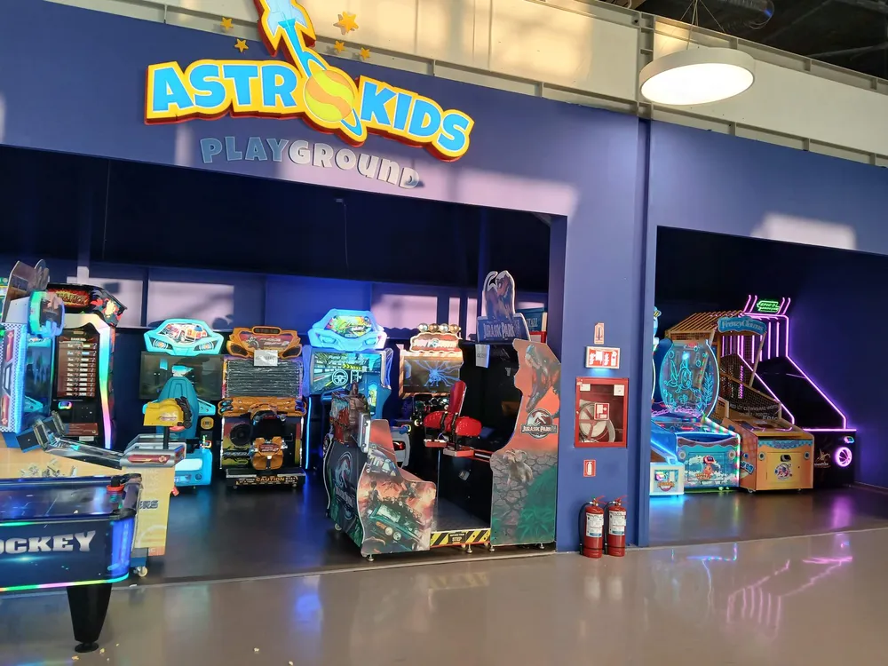 Astrokids Playground next to the cinema, October 2026: driving and motorbike games, air hockey and ticket machines