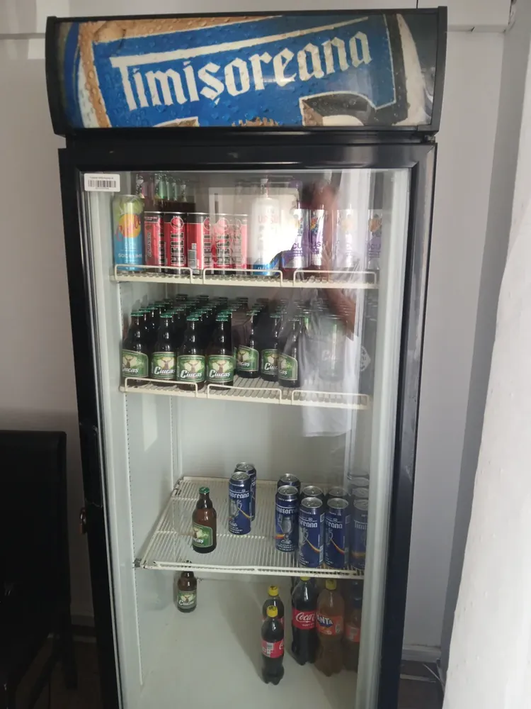 The drinks fridge — Ciucaș and Timișoreana, energy drinks, Coca-Cola and Fanta