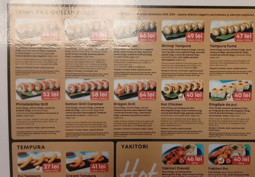 Same board, Tempura & Grilled Rolls — Shrimp Tempura 8buc/249g 49 lei, Tempura Fume 8buc/259g 47 lei, Philadelphia Grill 8buc/272g 52 lei, Somon Grill Caramel 8buc/300g 58 lei, Dragon Grill 8buc/299g 64 lei, Hot Chicken 8buc/244g 40 lei. September 2026